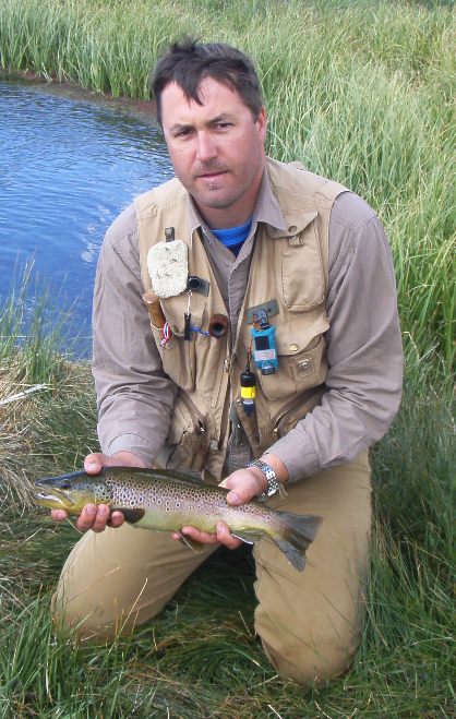 Erik and an 18 inches Brown Trout.