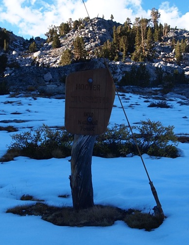Trail sign at dusk.